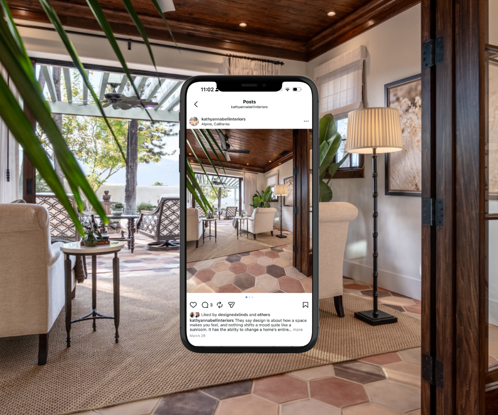 Interior design sunroom with iPhone displaying Instagram app interface overlay
